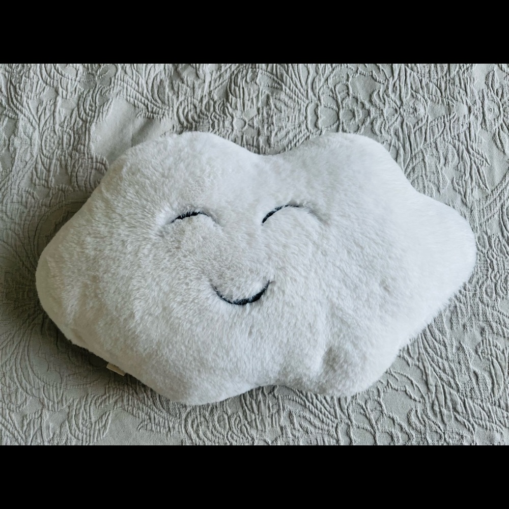 Zara Home kids fur effect cloud-shaped throw pillow.